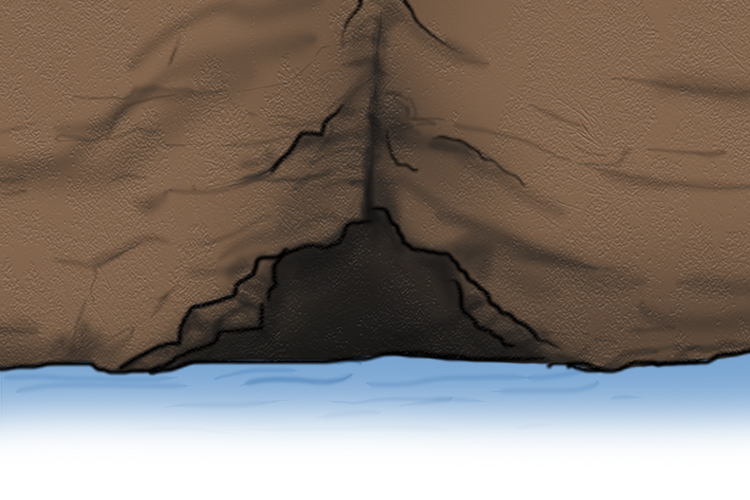 The crack grows into a cave by hydraulic action and abrasion.